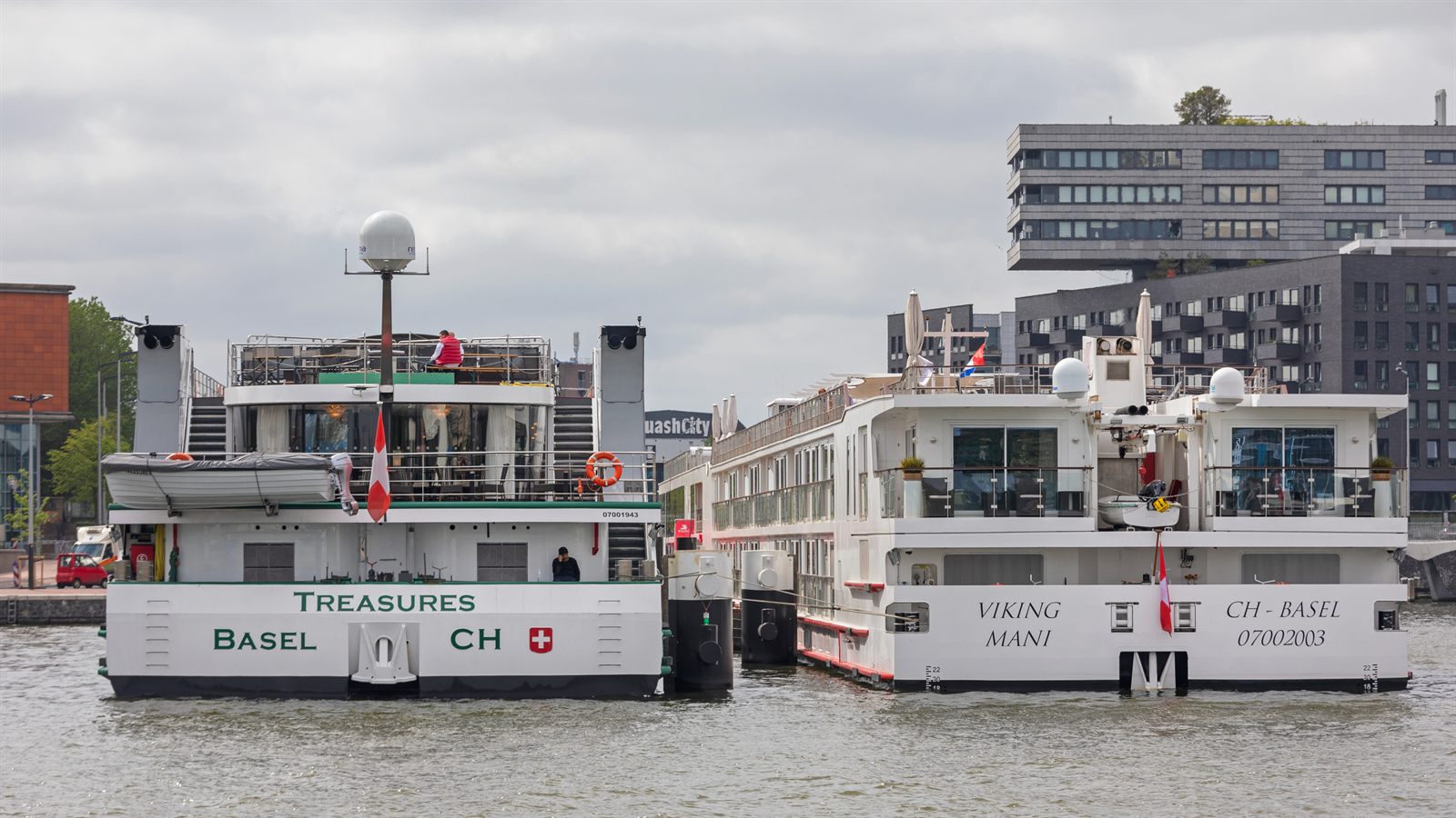 River ships moored side by side at a city quay
