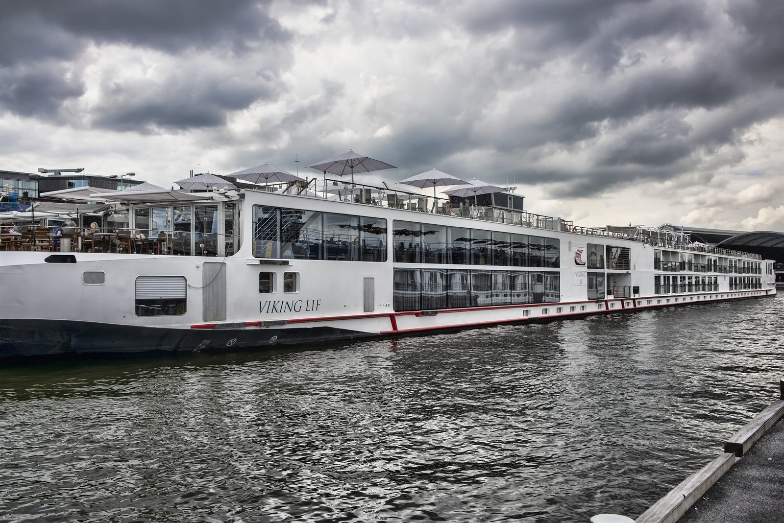 River cruise ship moored at a quay